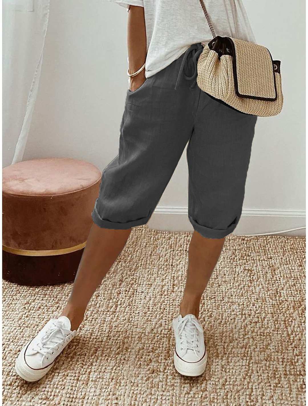 Women's elastic waist pull-on shorts with a comfortable straight leg crop, perfect for summer.