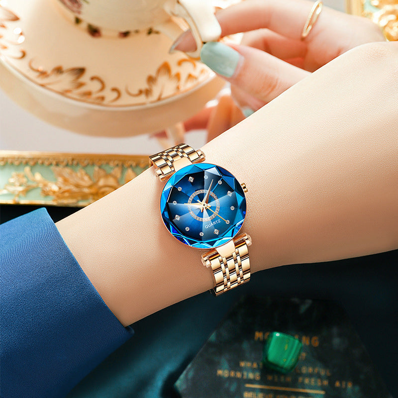 Fashionable women's wrist watch with a shimmering diamond dial and durable stainless steel strap.