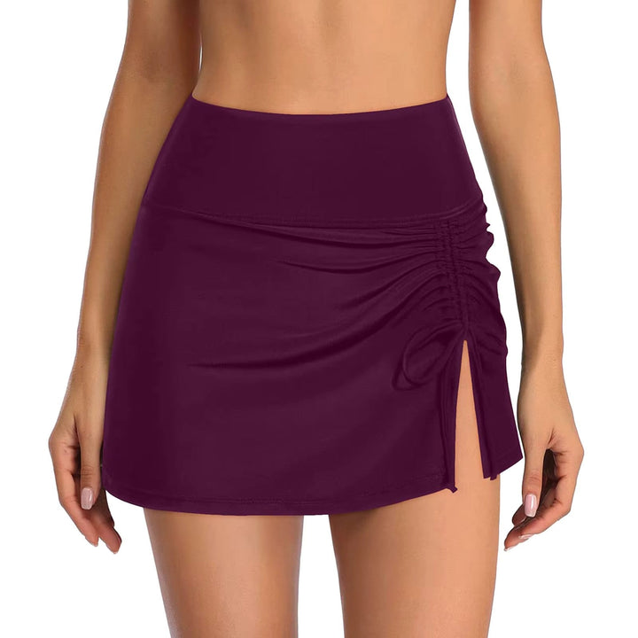 Lightweight quick-dry women's swim shorts with a stylish side slit, great for summer fashion.
