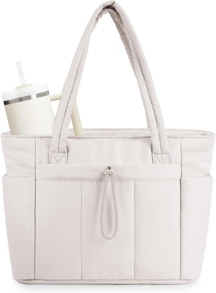 Women's quilted puffer tote bag with cup holder & laptop sleeve for travel.