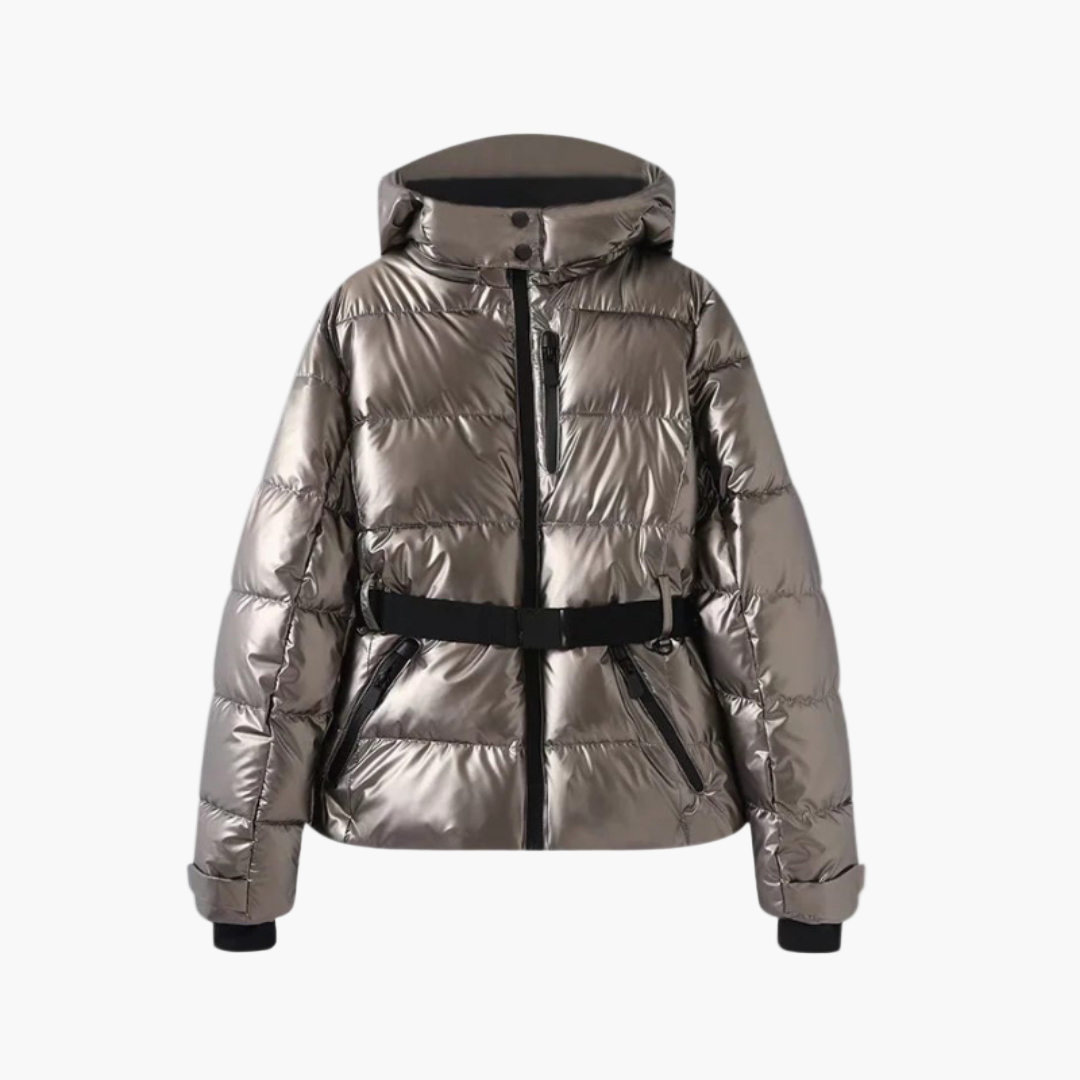 Studio shot of a women's winter quilted coat, belted at waist, with functional pockets
