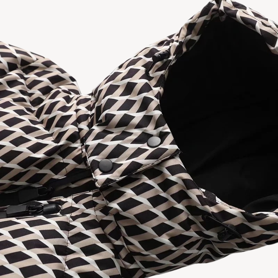 Full length view of a women's belted quilted winter jacket, with the hood up for warmth