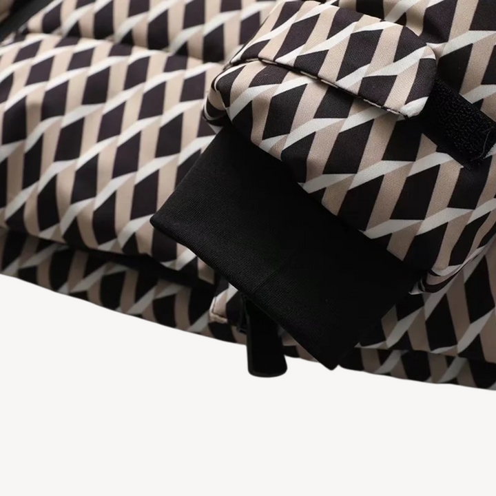 Detail of the hood and collar on a belted women's quilted jacket, suitable for cold weather