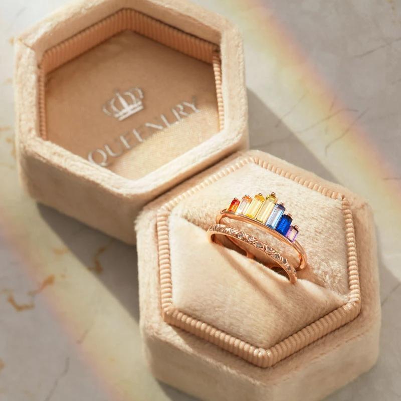 Rainbow micro diamond ring on a woman's hand, fashionable, statement jewelry