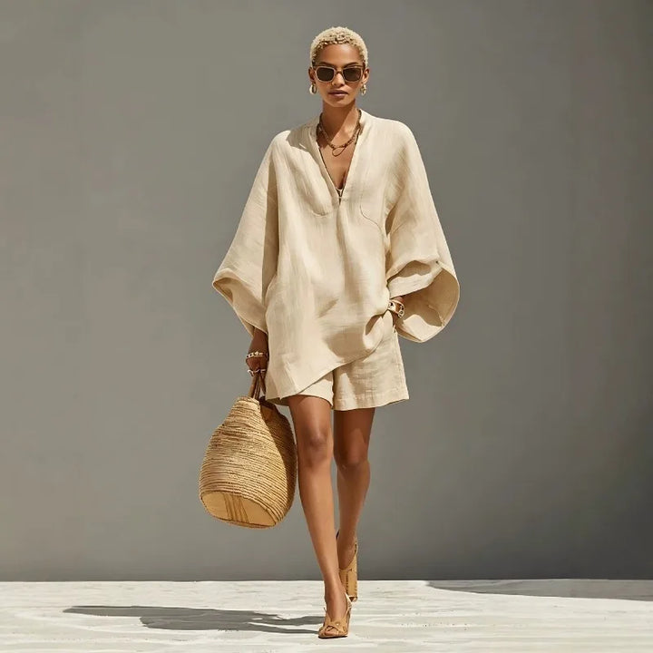 Women's relaxed batwing v-neck shorts set, perfect for summer casual wear or vacation loungewear. Chic two-piece outfit.