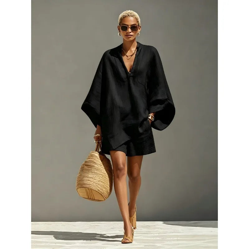 Chic women's batwing v-neck top & matching shorts set. Ideal comfy loungewear or beach outfit for relaxed summer style.