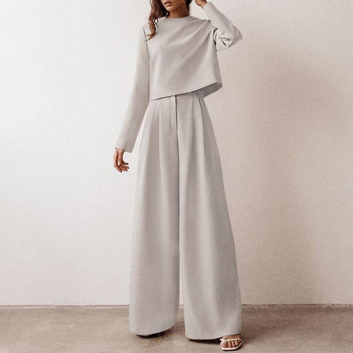 Summer-ready women's two-piece outfit: a comfy cropped top paired with wide-leg trousers.