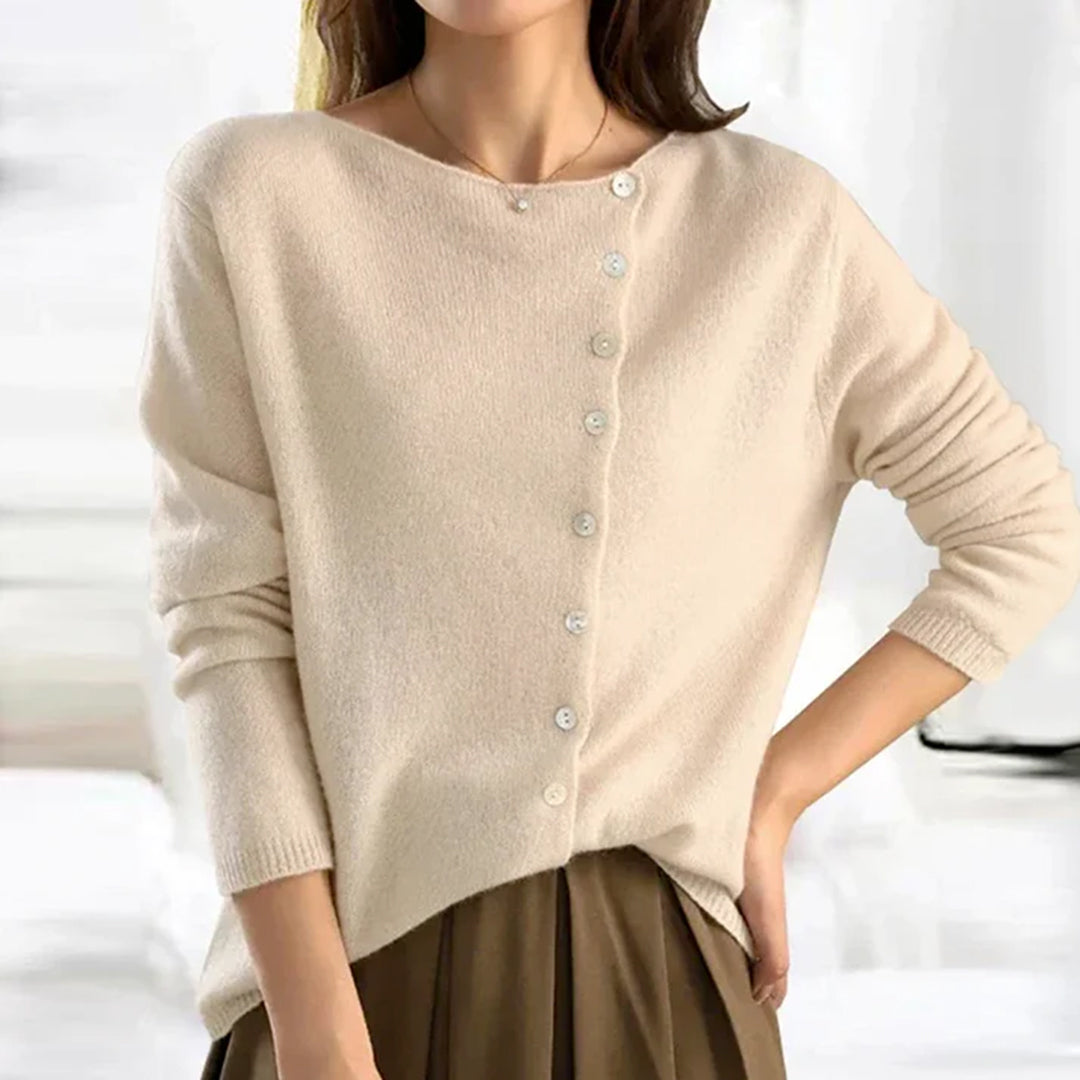 Cozy women's relaxed fit button-front cardigan, ideal for comfortable and stylish winter layering.