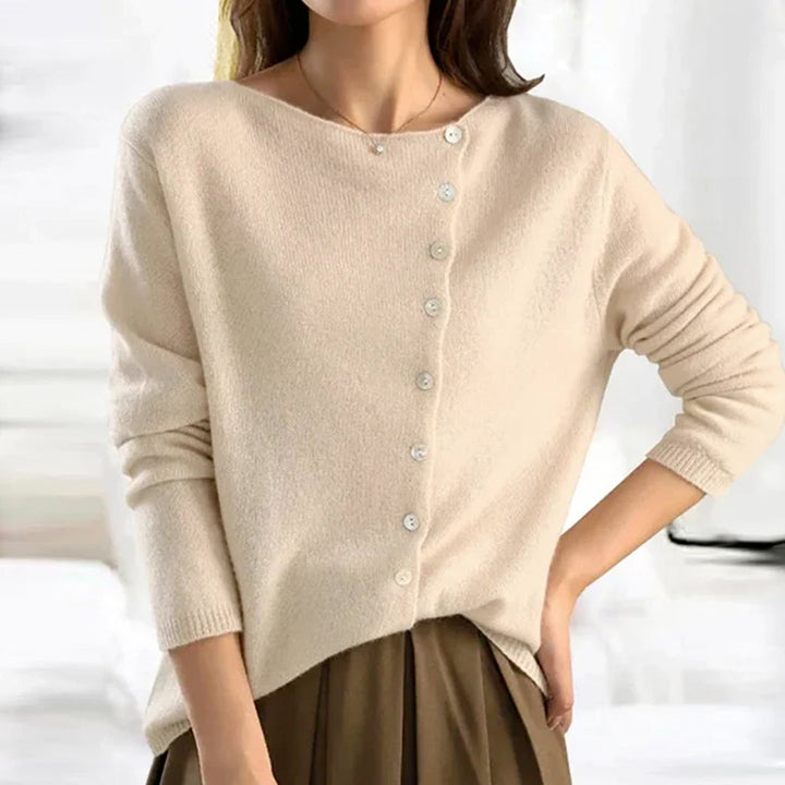Cozy women's relaxed fit button-front cardigan, ideal for comfortable and stylish winter layering.
