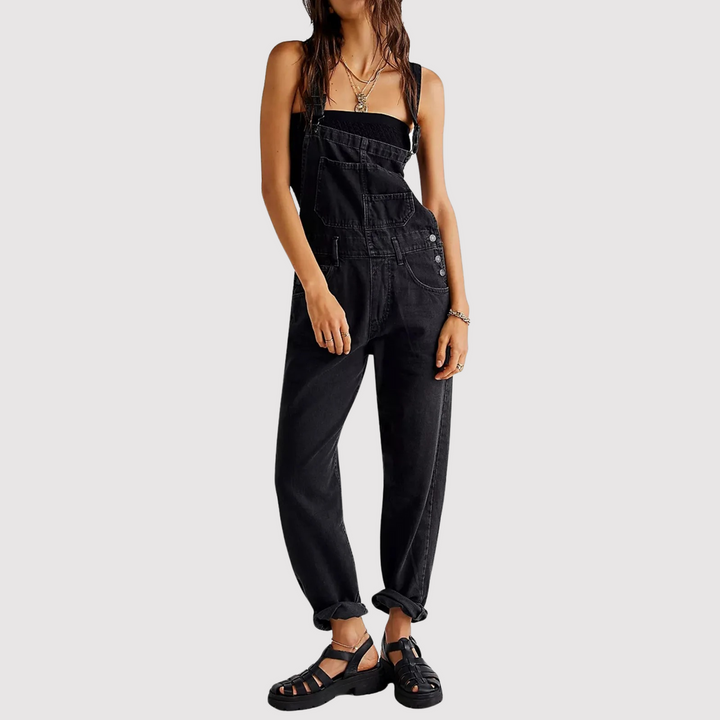 Stylish women's denim dungarees with a relaxed fit. Casual blue overalls, a comfortable and versatile fashion choice.