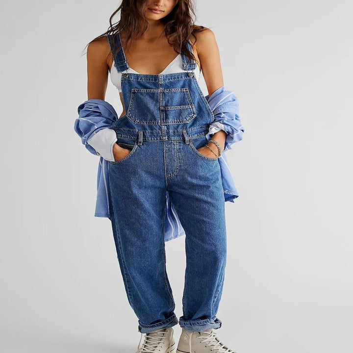 Soft women's relaxed fit denim overalls, ideal for casual wear. Comfortable and trendy dungarees for versatile outfits.