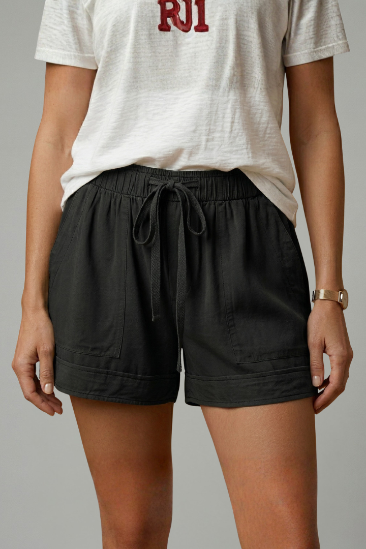 Relaxed fit women's shorts with practical pockets for convenience.