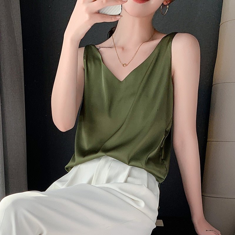 Women's elegant satin tank top with a V-neck and relaxed fit, ideal for warm weather.
