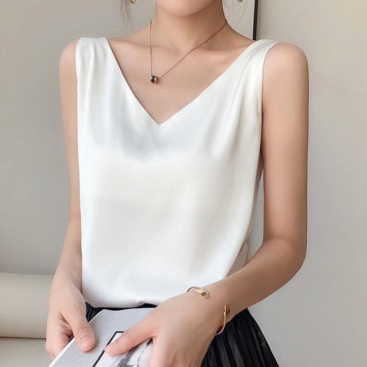 Satin V-neck sleeveless top for women, featuring a comfortable relaxed fit.