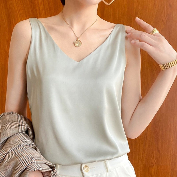 Elegant women's relaxed fit satin tanktop with a flattering V-neck design.
