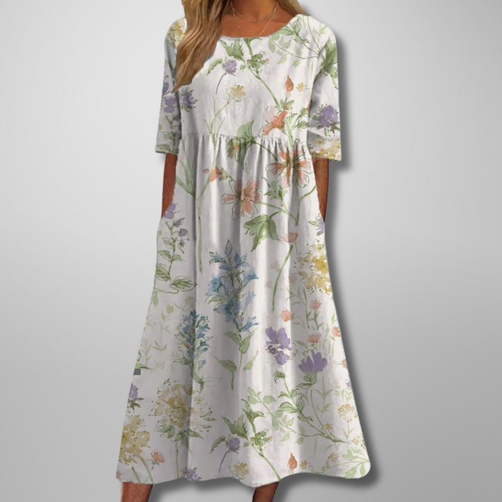 Versatile women's floral midi dress, relaxed fit, perfect for elegant spring & summer wear.