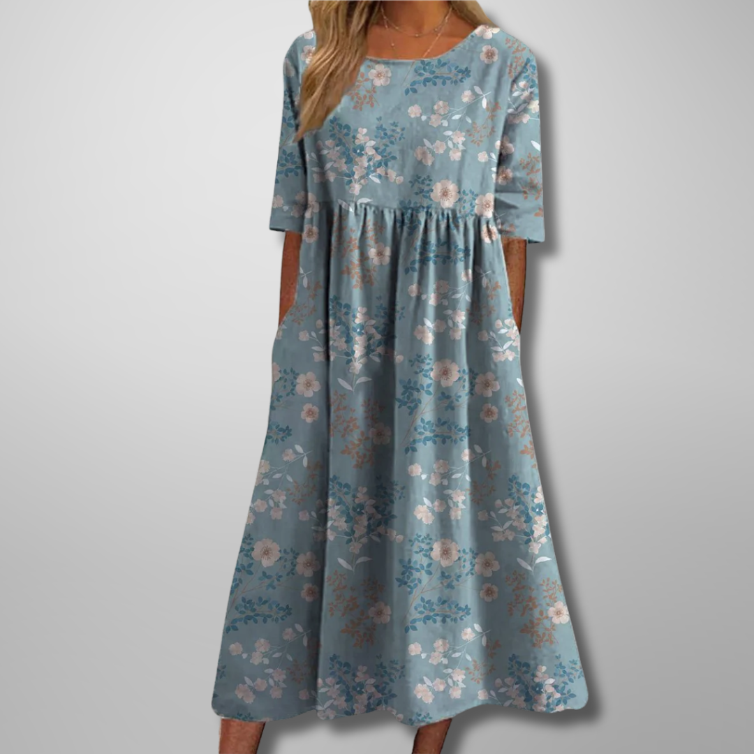 Beautiful women's floral print midi dress with a relaxed, flowy silhouette for summer style.