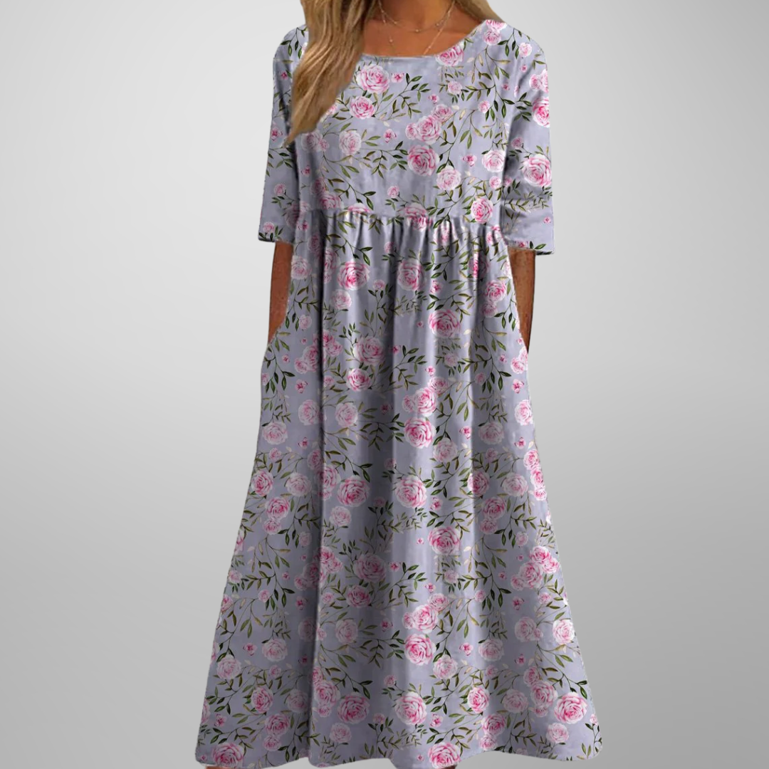 Effortless women's relaxed floral midi dress, a comfortable and stylish choice for any casual outing.