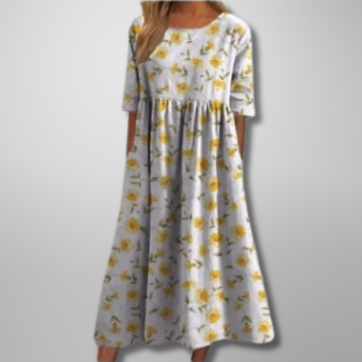 Chic women's relaxed floral midi dress, great for spring parties or elegant summer brunches.