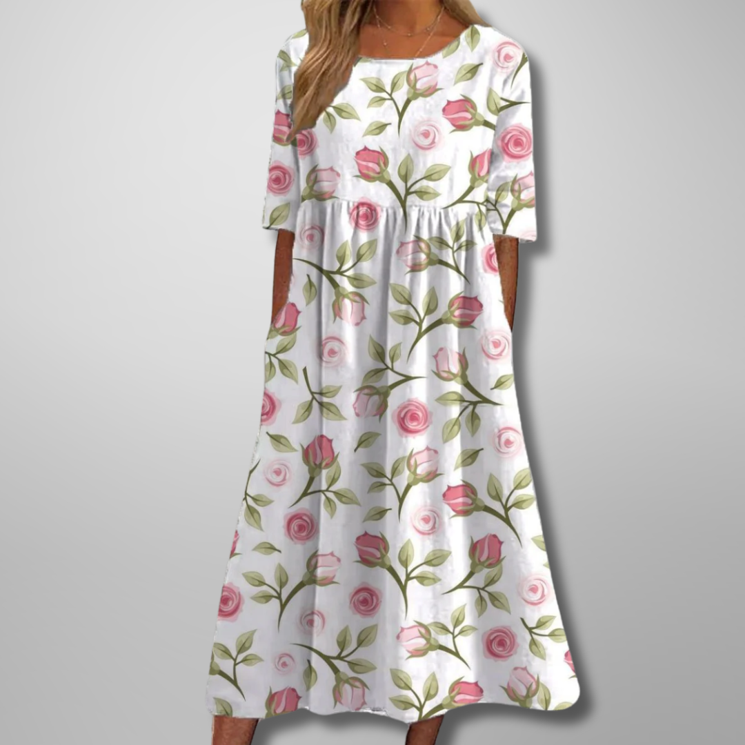 Women's relaxed floral midi dress. Effortless, comfortable, and versatile summer fashion.