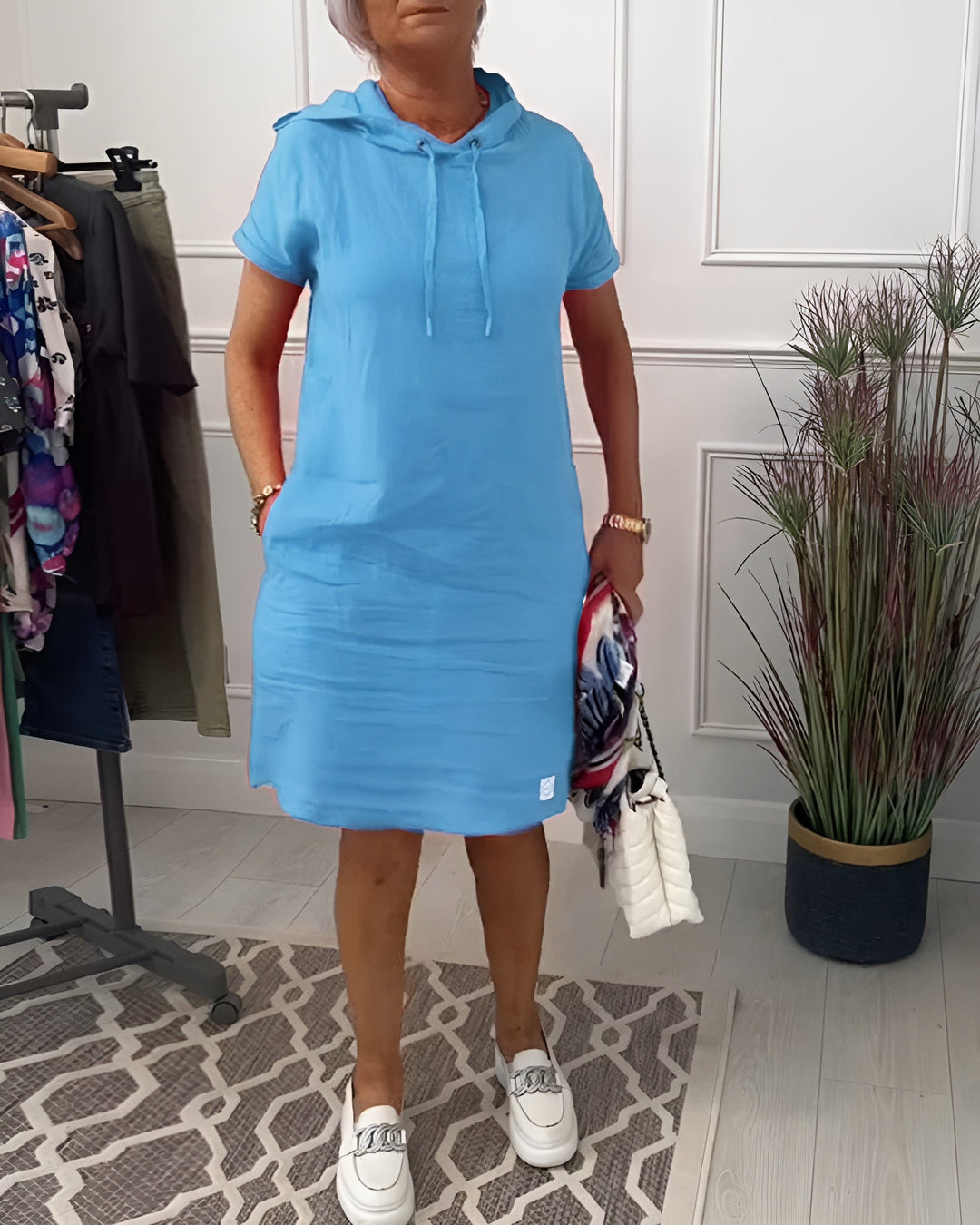 Adjustable hood on this women's relaxed fit hoodie midi dress, perfect for casual everyday style.