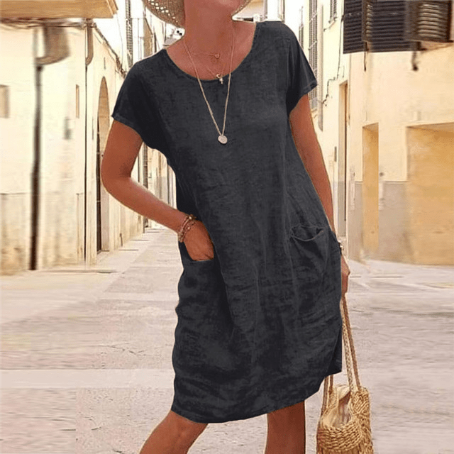 Women's relaxed fit mini dress with convenient pockets, perfect for casual summer wear and everyday comfort.
