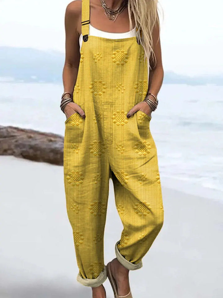 Light and airy women's patterned wide-leg jumpsuit. Relaxed fit for cool, comfortable summer fashion.