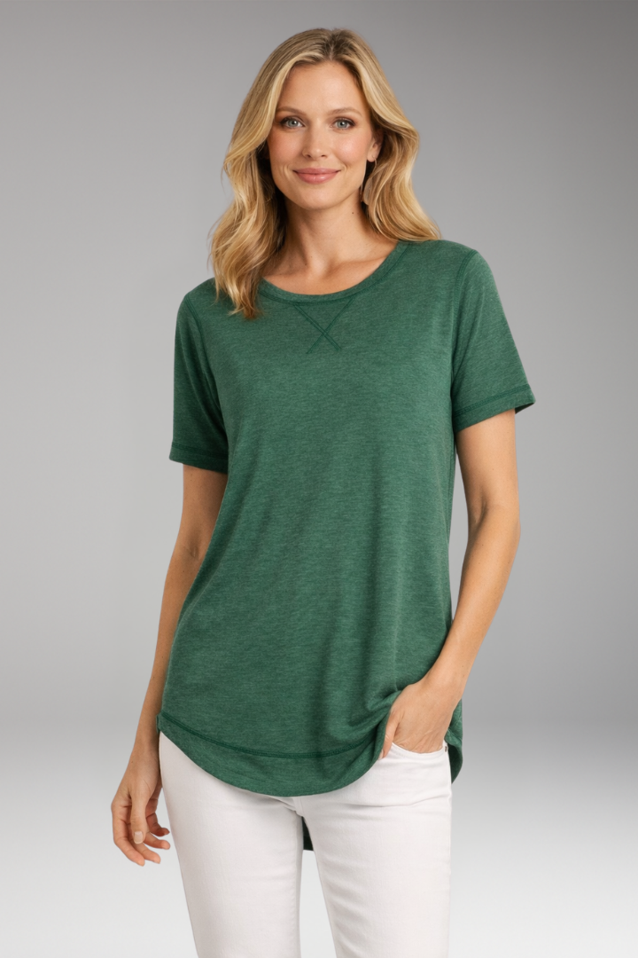 Comfortable women's casual top. Features a relaxed fit, round neck, short sleeves, and stylish curved hem.