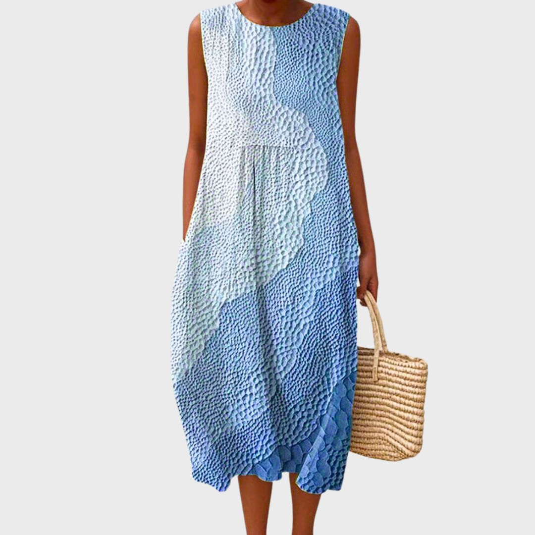 Comfortable women's summer sleeveless dress, relaxed knee-length fit for casual everyday wear.