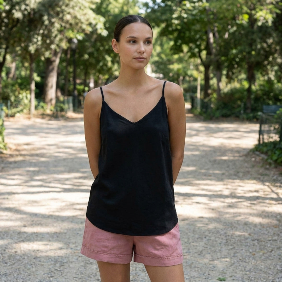 Stylish women's relaxed fit summer top, featuring delicate spaghetti straps.