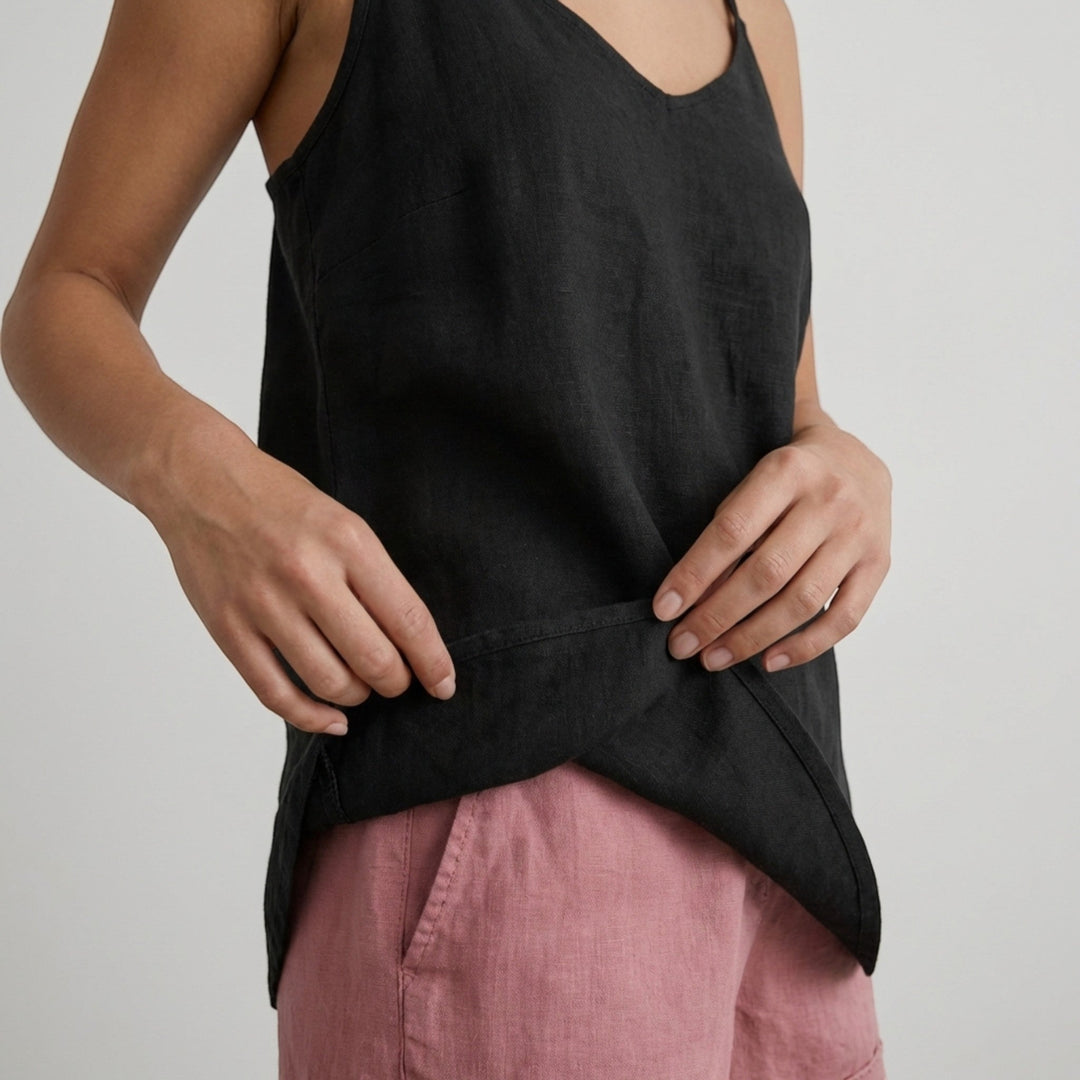Relaxed fit women's tank top with spaghetti straps, versatile for any outfit.
