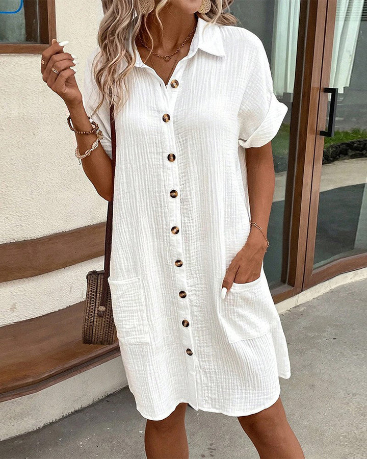 Versatile women's summer midi dress, offering a relaxed fit and elegant casual style for any warm day.