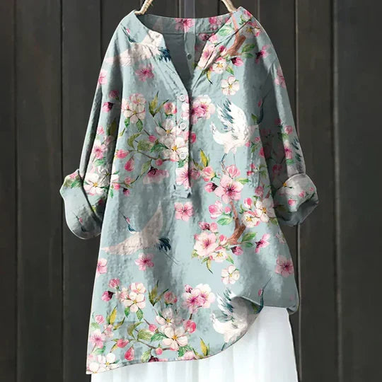 Women's relaxed fit top in soft fabric, perfect for casual summer wear & all-day comfort.