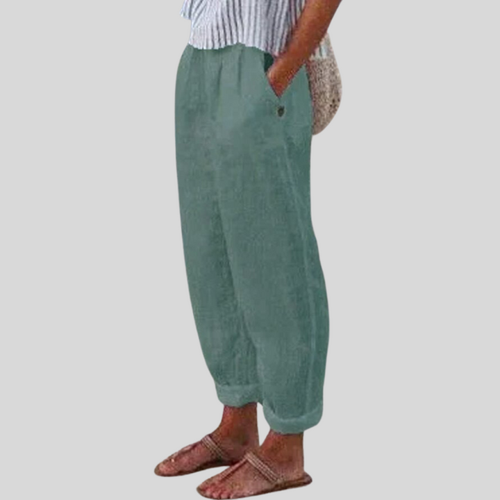 Chic women's relaxed fit pants, highlighted by a trendy folded hem, perfect for comfortable daywear.