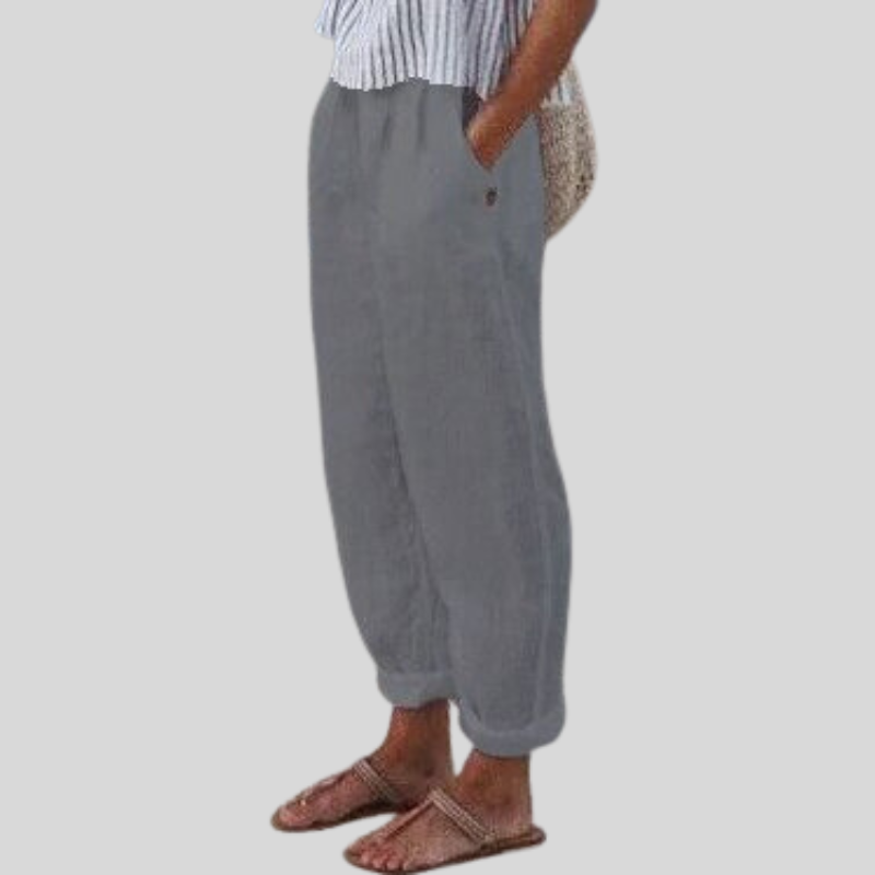 Modern women's relaxed fit casual trousers with a folded hem, offering an effortlessly chic summer style.