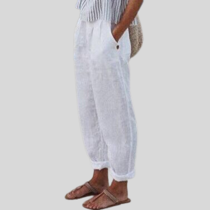 Soft women's relaxed fit trousers with folded hem, a versatile & comfortable choice for casual spring fashion.