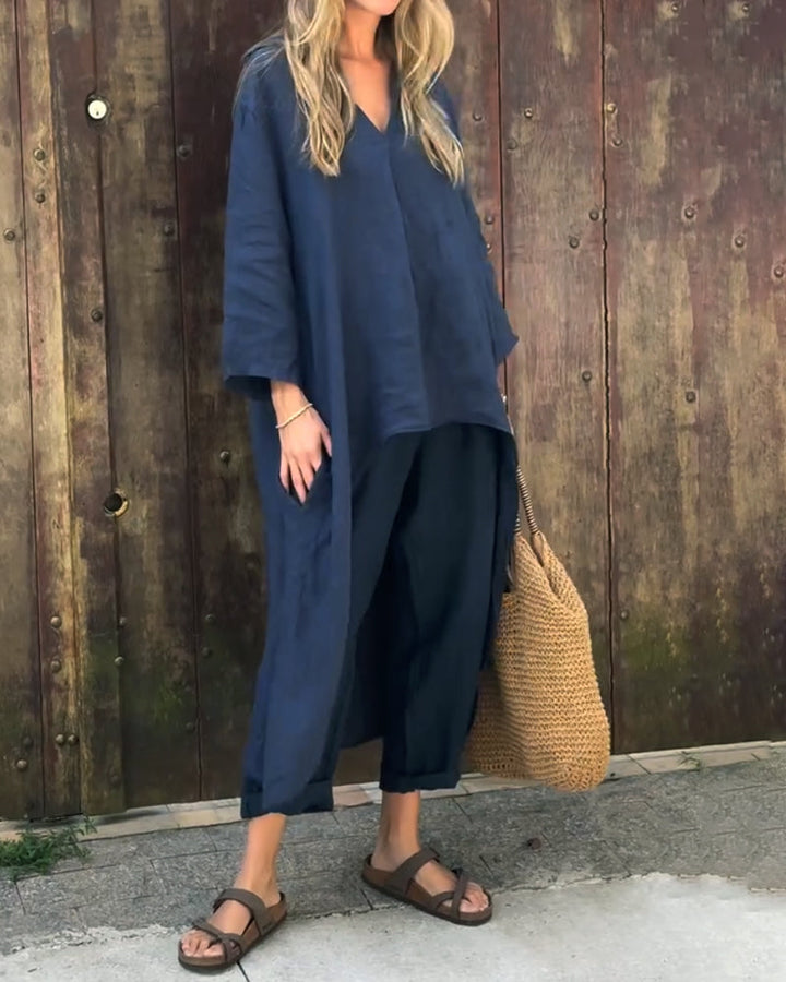 Two-piece women's loungewear set featuring a longline tunic and matching relaxed fit pants, ideal for travel.