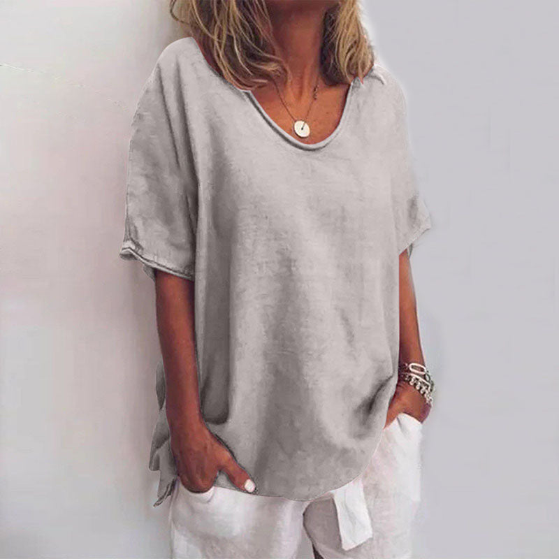 Women's relaxed fit V-neck blouse with elbow sleeves, perfect for summer casual wear and everyday style.