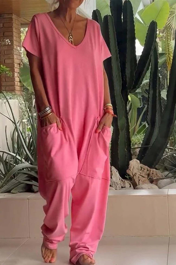 Women's relaxed fit V-neck short sleeve dropped crotch jumpsuit, perfect for casual comfort & loungewear.
