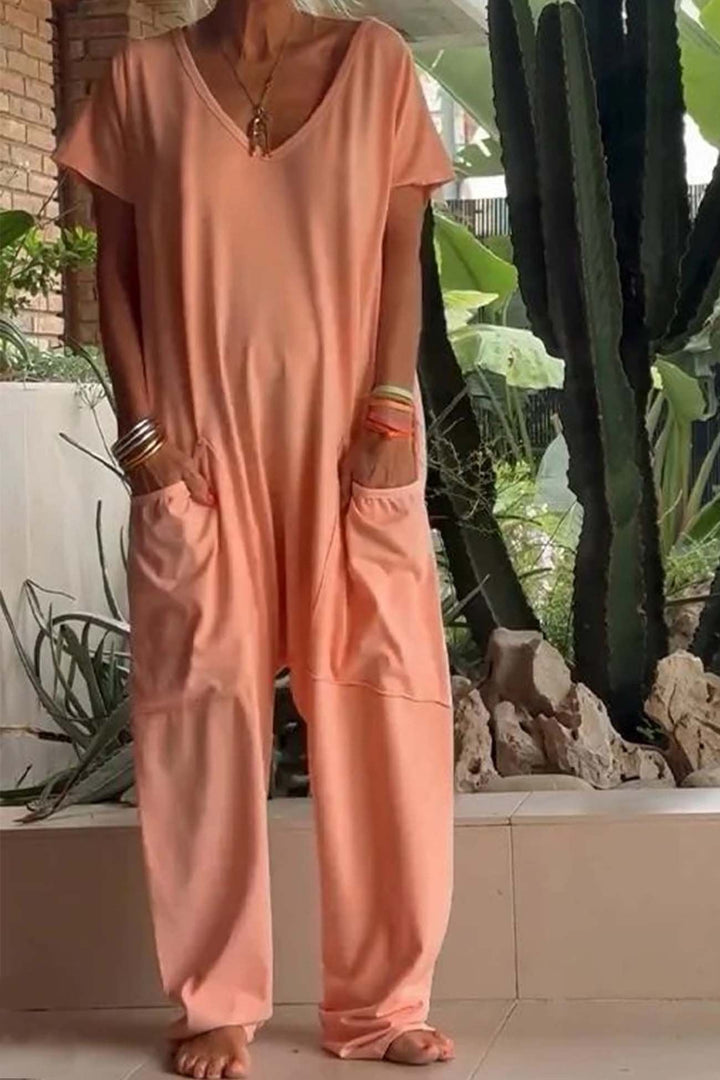 Versatile women's V-neck short sleeve dropped crotch jumpsuit, great for casual outings, loungewear or travel.