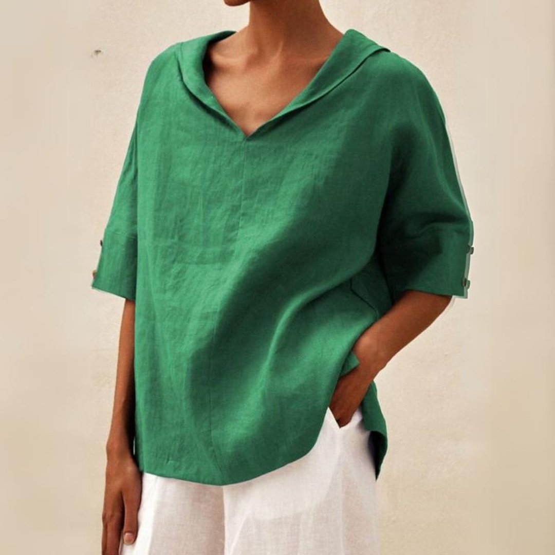 Women's relaxed fit V-neck spring top in a soft, lightweight fabric for casual everyday wear.
