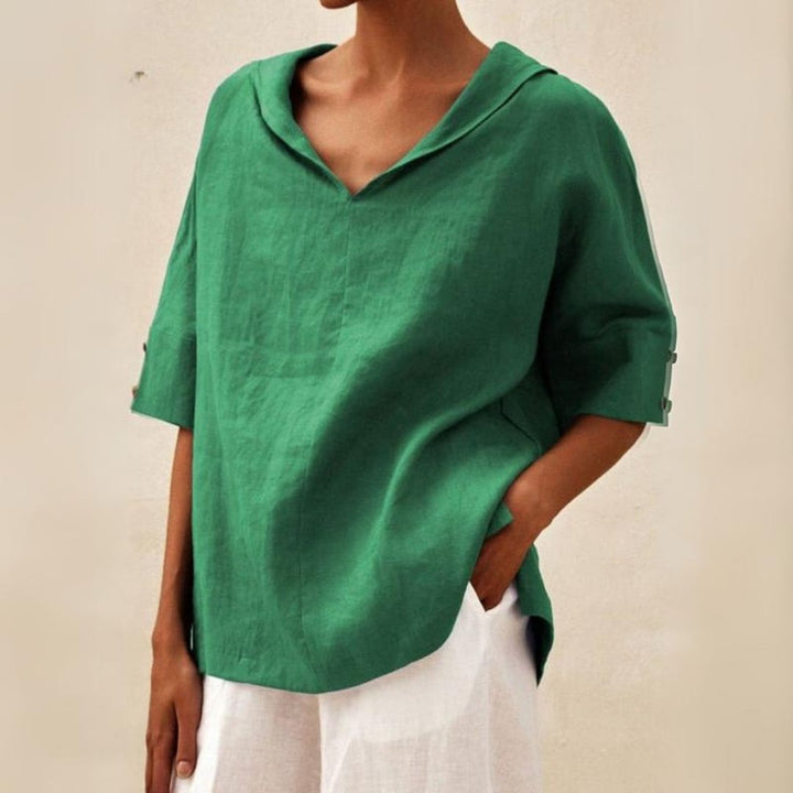 Women's relaxed fit V-neck spring top in a soft, lightweight fabric for casual everyday wear.