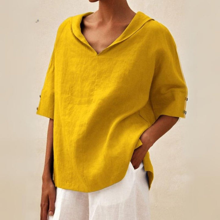 Lightweight women's spring top with a comfortable relaxed V-neck, ideal for everyday casual style.