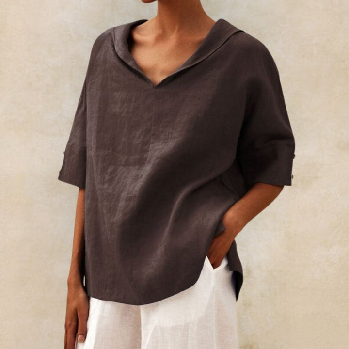 Relaxed fit V-neck top for women, a versatile and comfortable piece for spring and everyday wear.