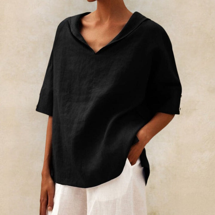 Lightweight and comfortable women's relaxed V-neck spring top, great for casual occasions.