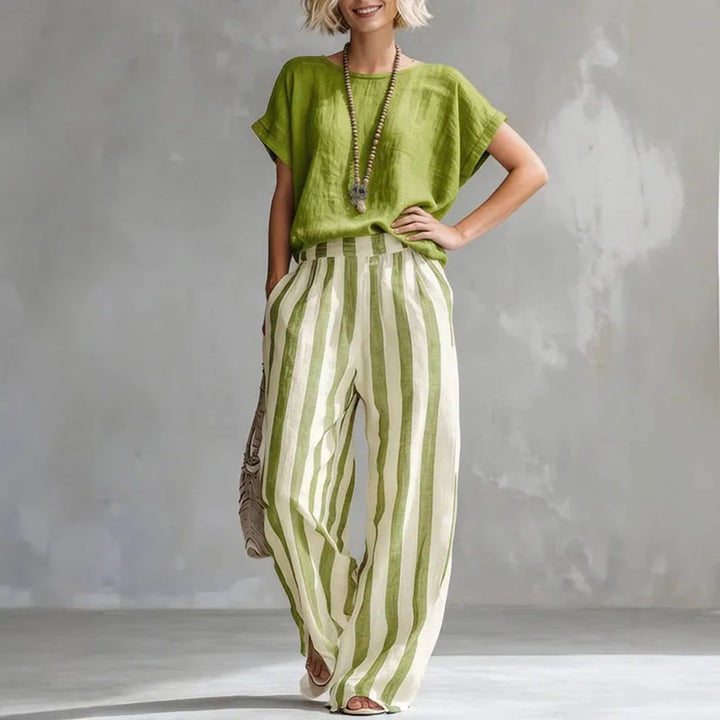 Complete women's summer outfit: relaxed linen blend set with stylish wide-leg pants & a comfortable short-sleeve top.