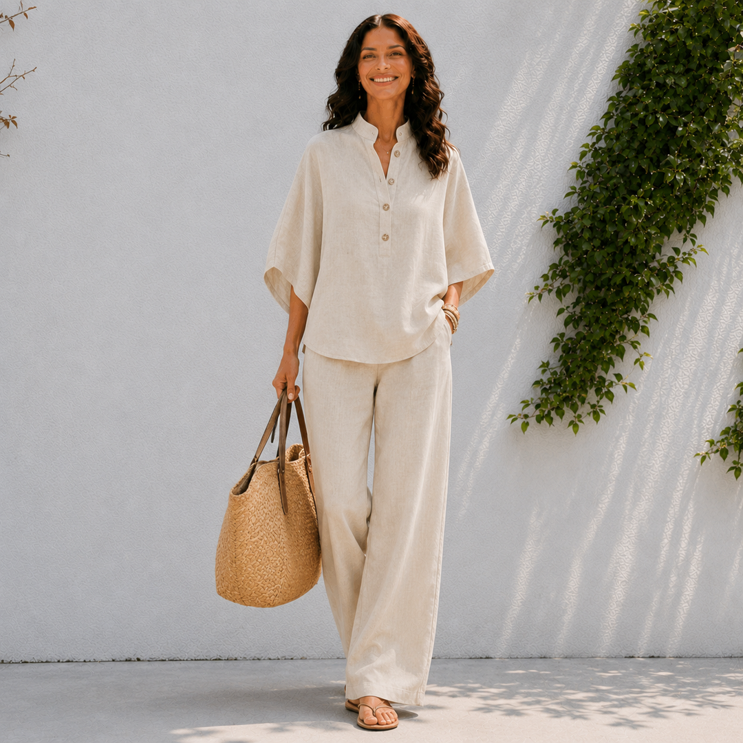Women's relaxed oversized blouse & wide leg pants matching set, perfect comfortable travel outfit.