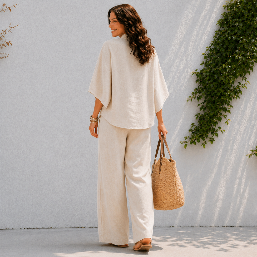 Stylish women's two-piece set featuring an oversized top & wide leg pants for a comfortable casual look.