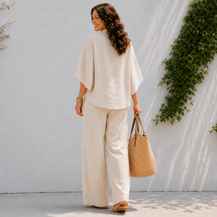 Stylish women's two-piece set featuring an oversized top & wide leg pants for a comfortable casual look.