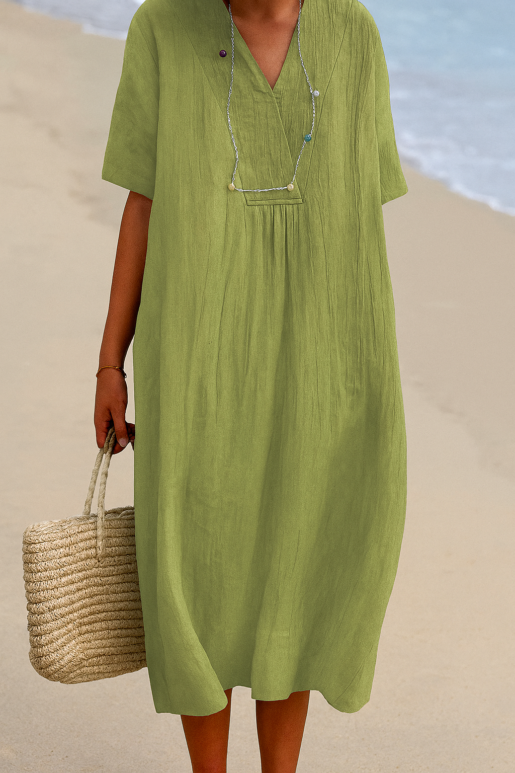 V-neck short sleeve beach dress for women, a comfortable relaxed fit, ideal for vacation wear.